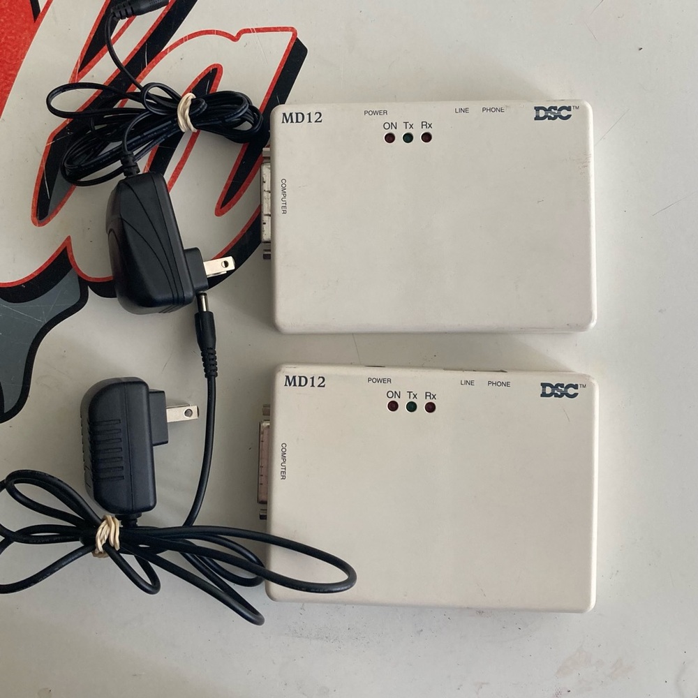 DSC MD12 modems with power supplies bundle of 2 tested